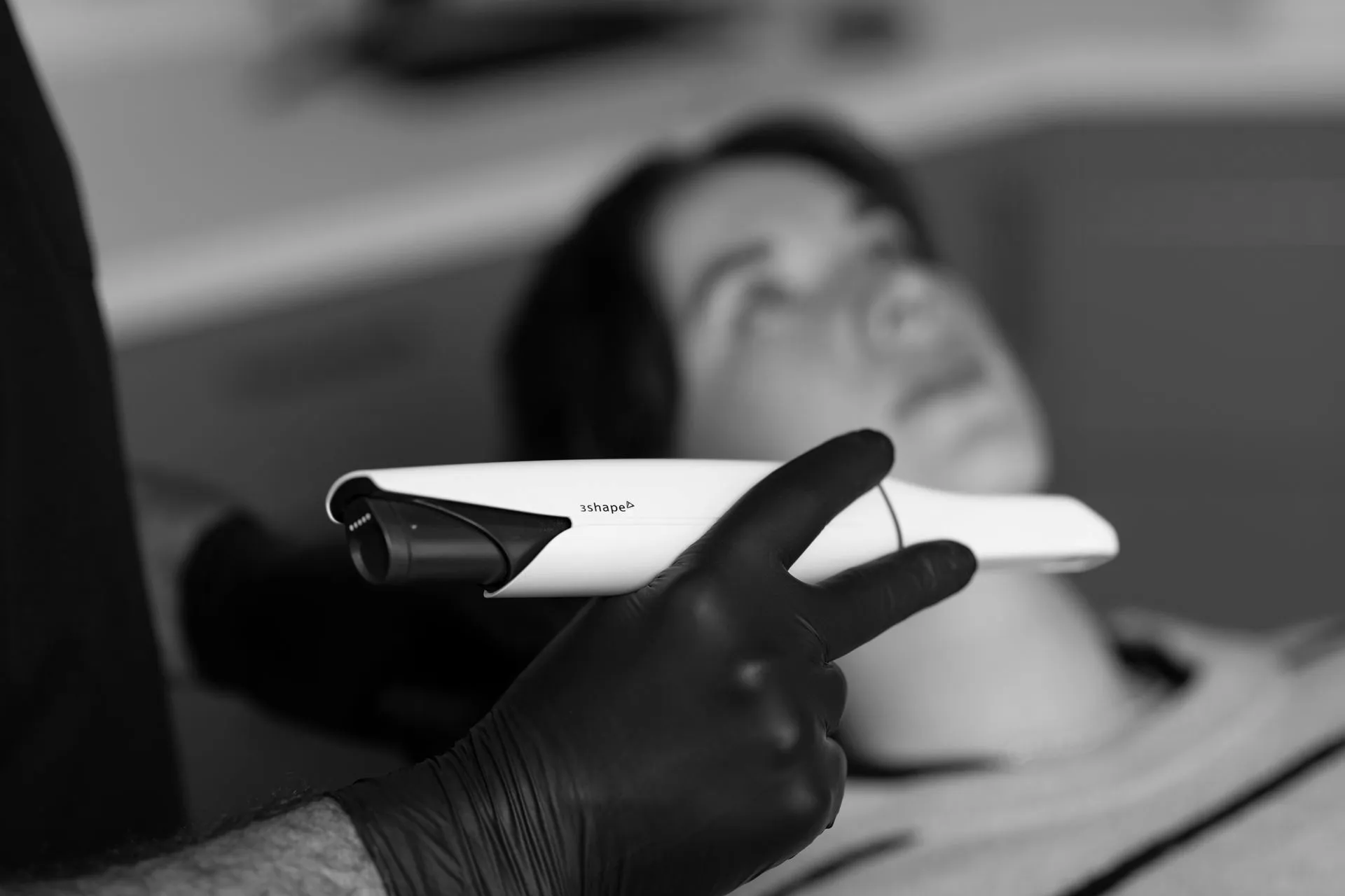 Dentist using a 3Shape digital intraoral scanner for smile design at Dental.Affect