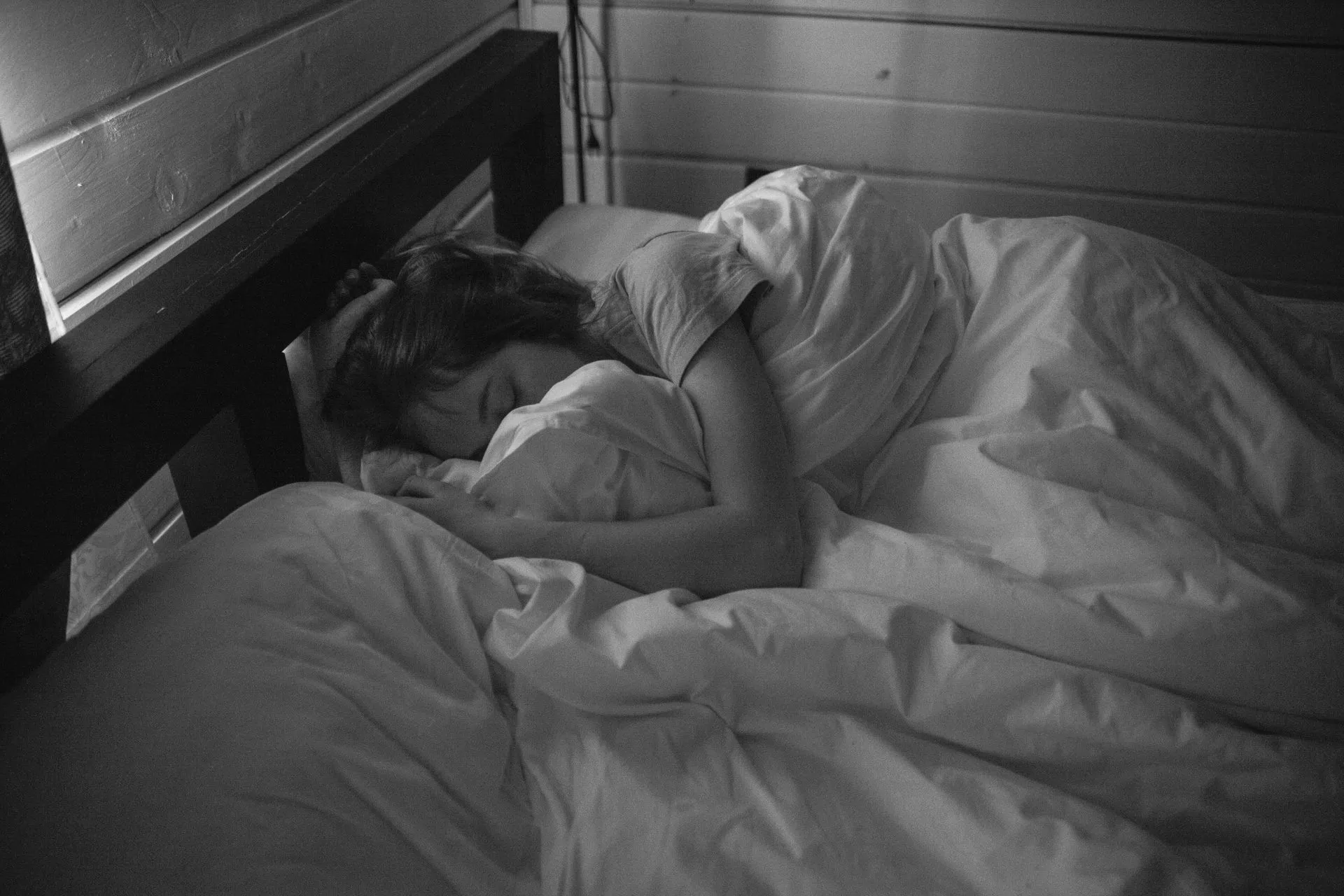 Person asleep in bed